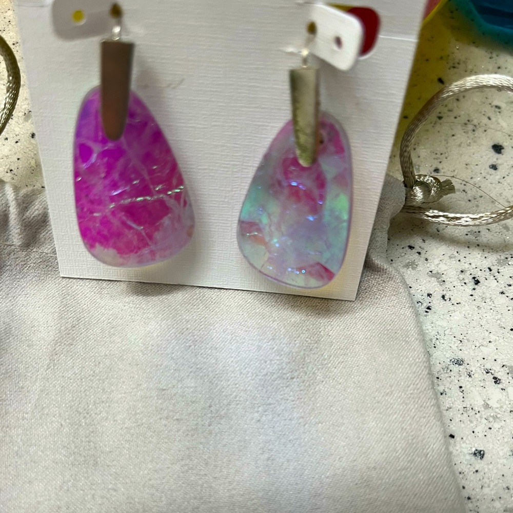 Kendra Scott earrings.